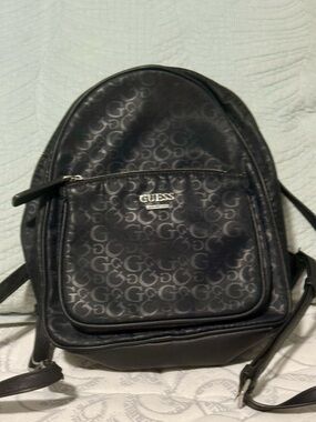 Guess Black Monogram Logo Mini Backpack, NWOT. Faux-leather and silver hardware.